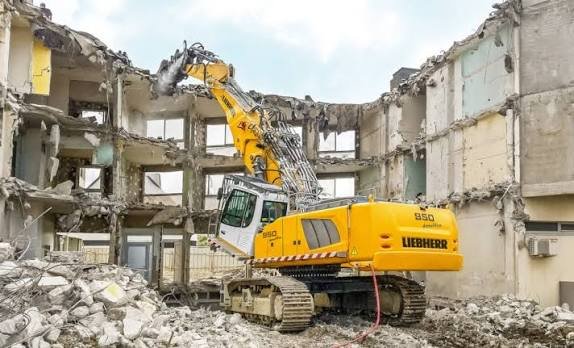 Demolition excavator working on site