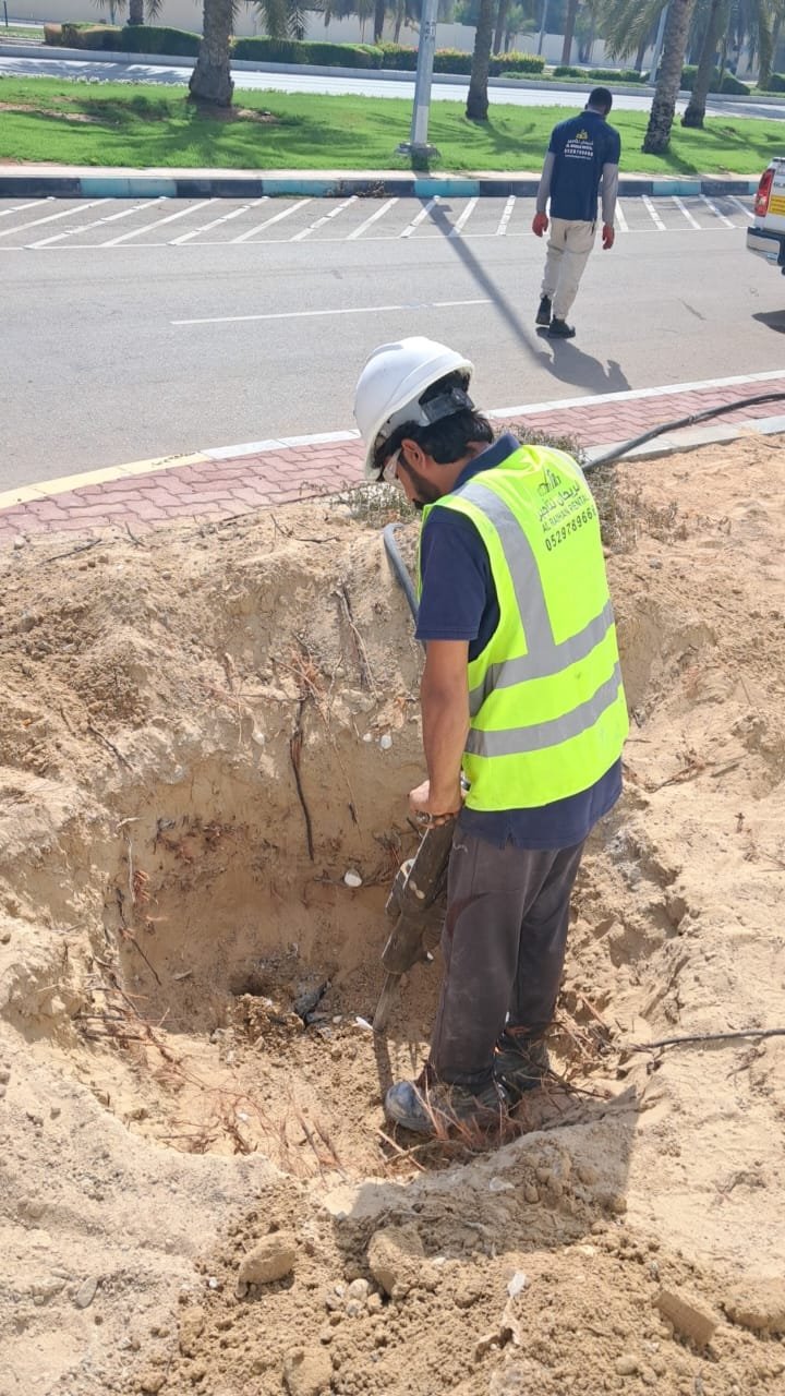 Demolishing work by air jack hammers in Abu Dhabi